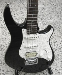 An electric guitar on a stand.